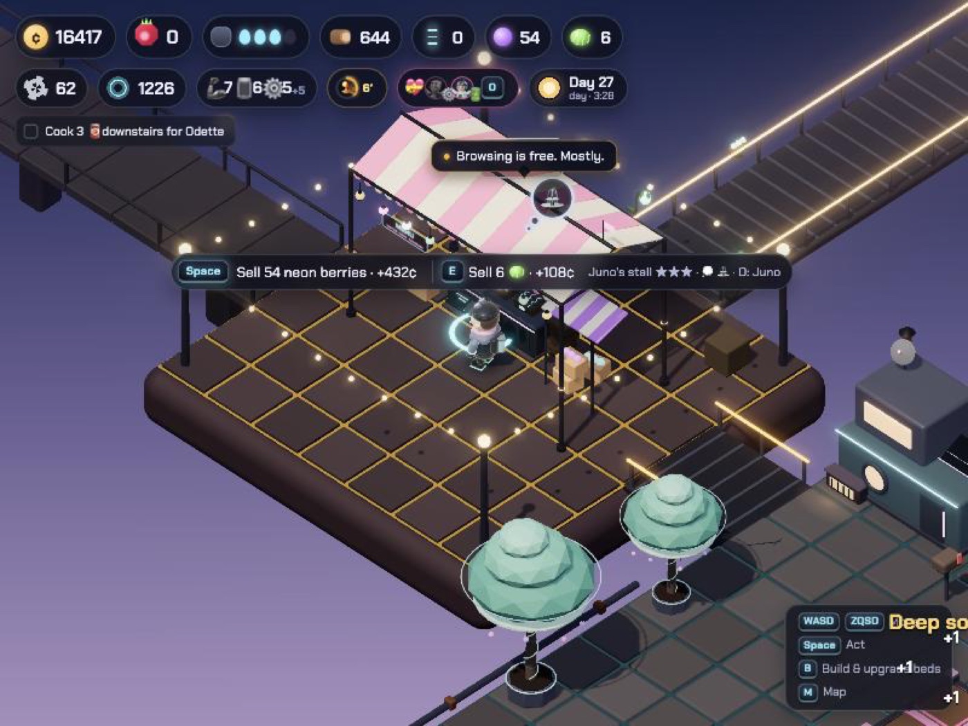 Juno's market stall on a small plaza island with string lights
