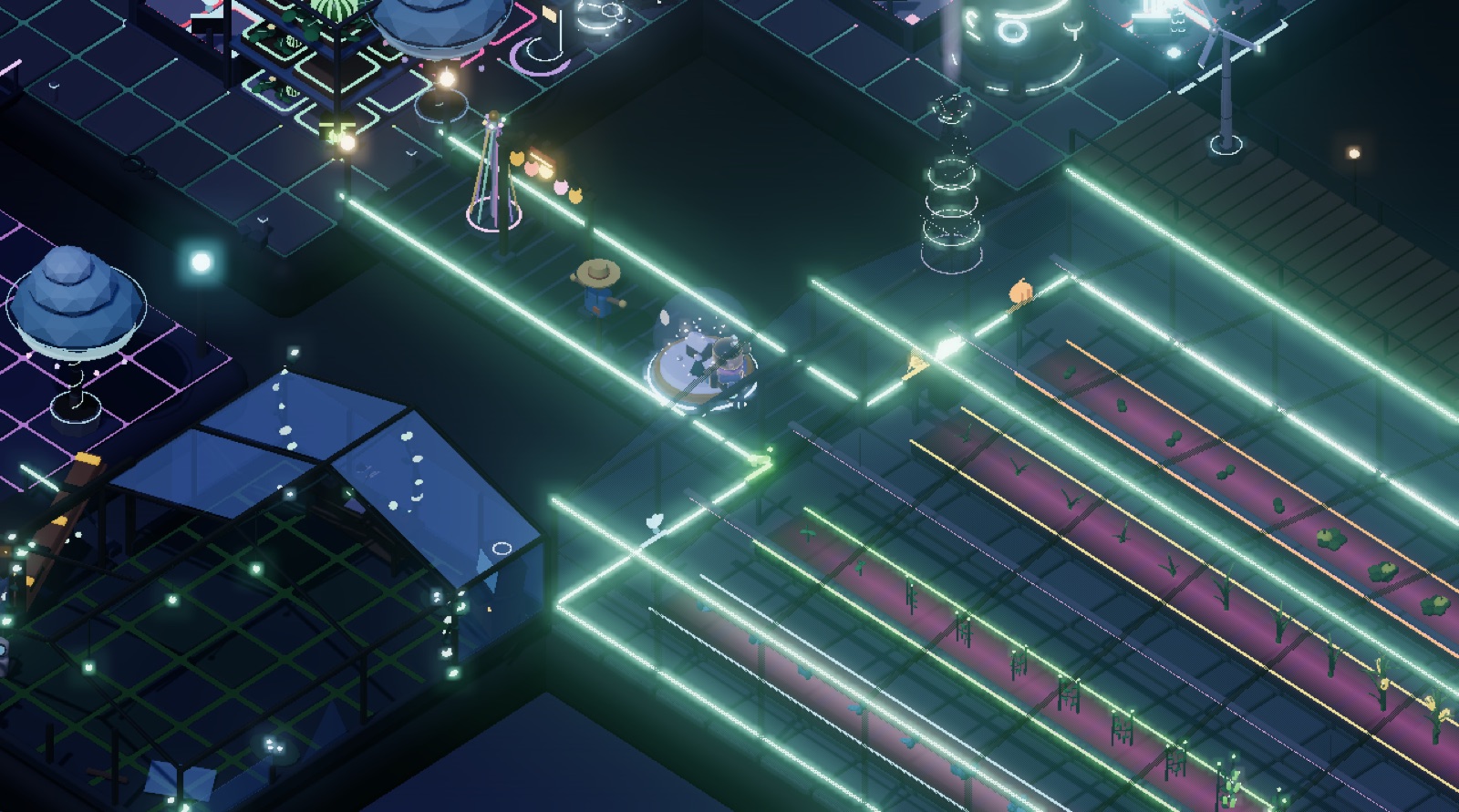The Grow Hall, a glass greenhouse lit magenta at night